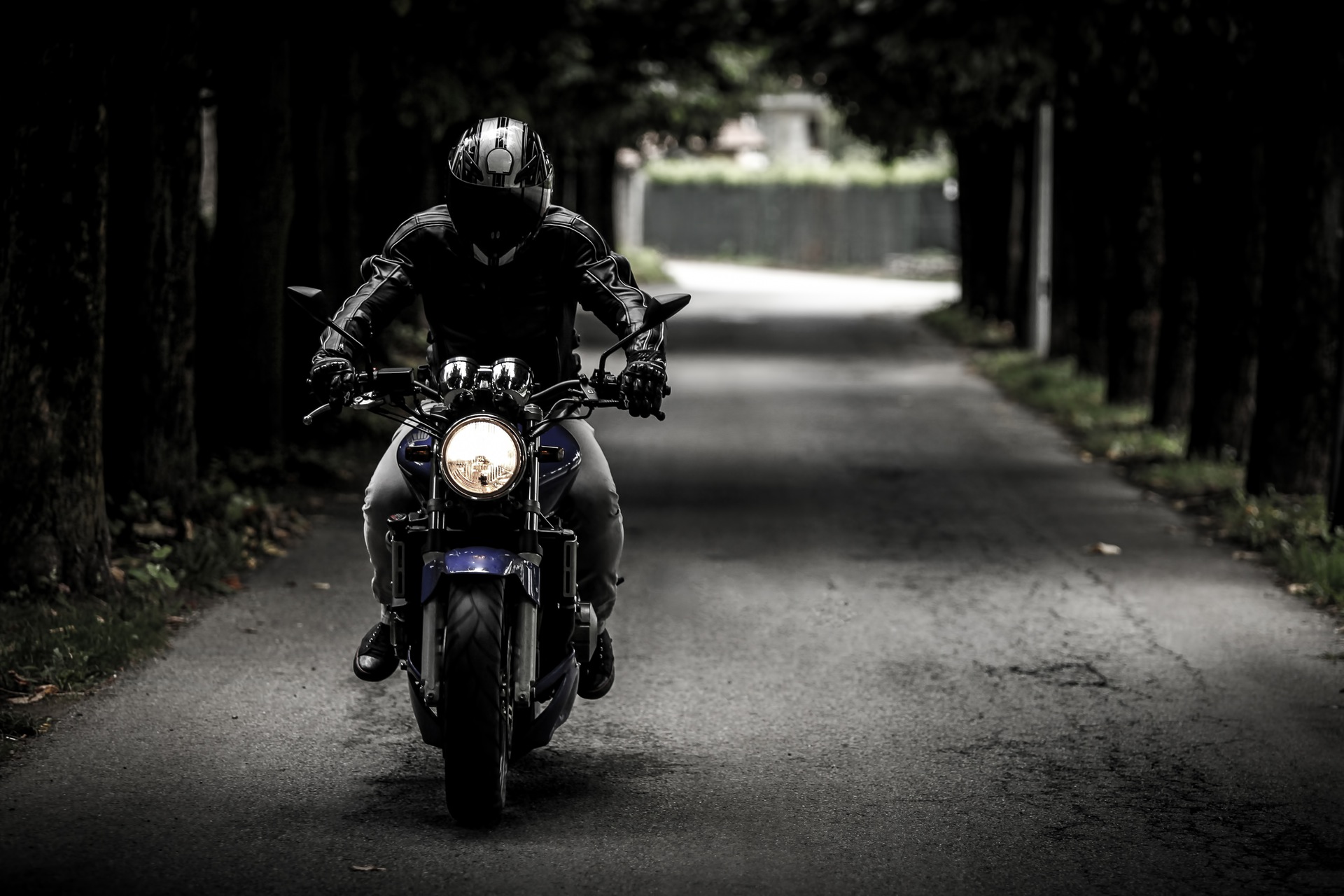 person-street-dark-bike street races