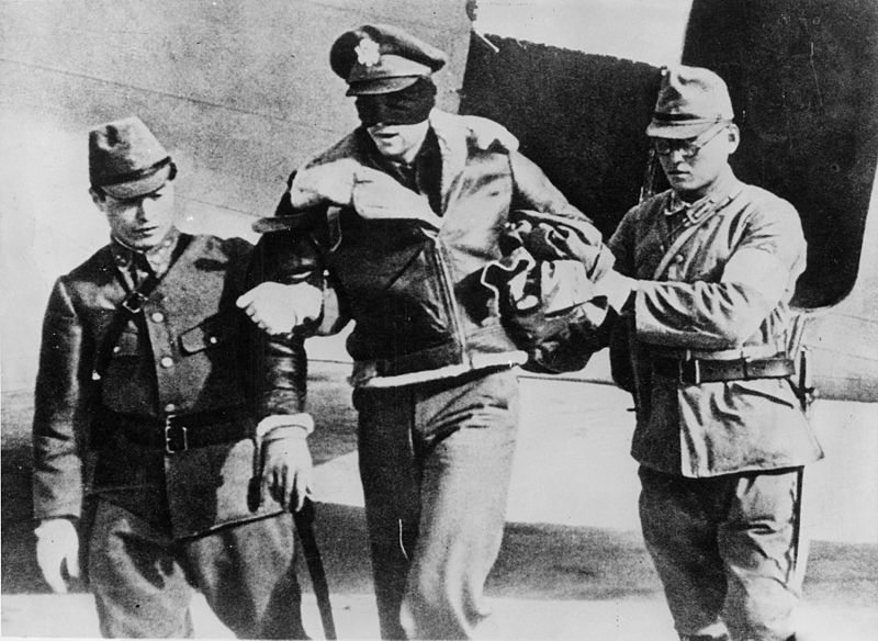 Doolittle_Raider_RL_Hite_blindfolded_by_Japanese_1942 military operations